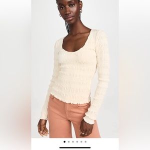 Frame Smocked long sleeve top. Bought and to late to return.